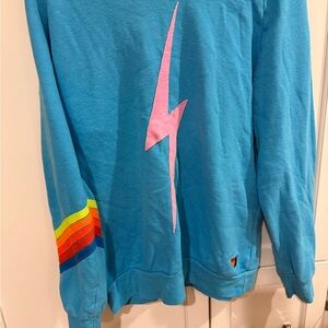Aviator Nation Blue Hoodie with Pink Lightning Bolt
